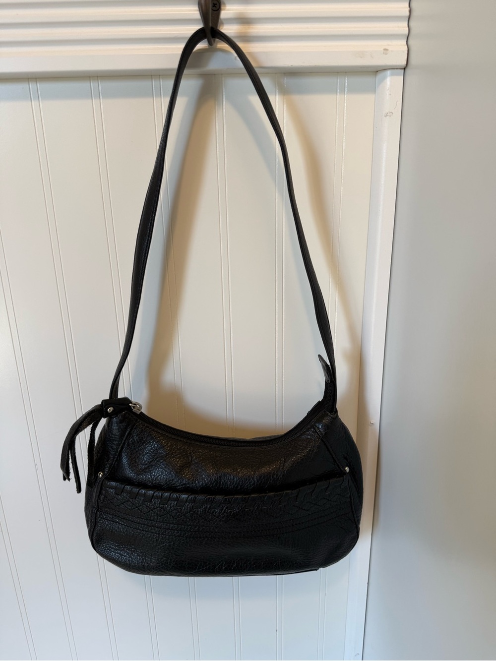 Stone Mountain Black Leather Shoulder Bag with Braid and fringe details.